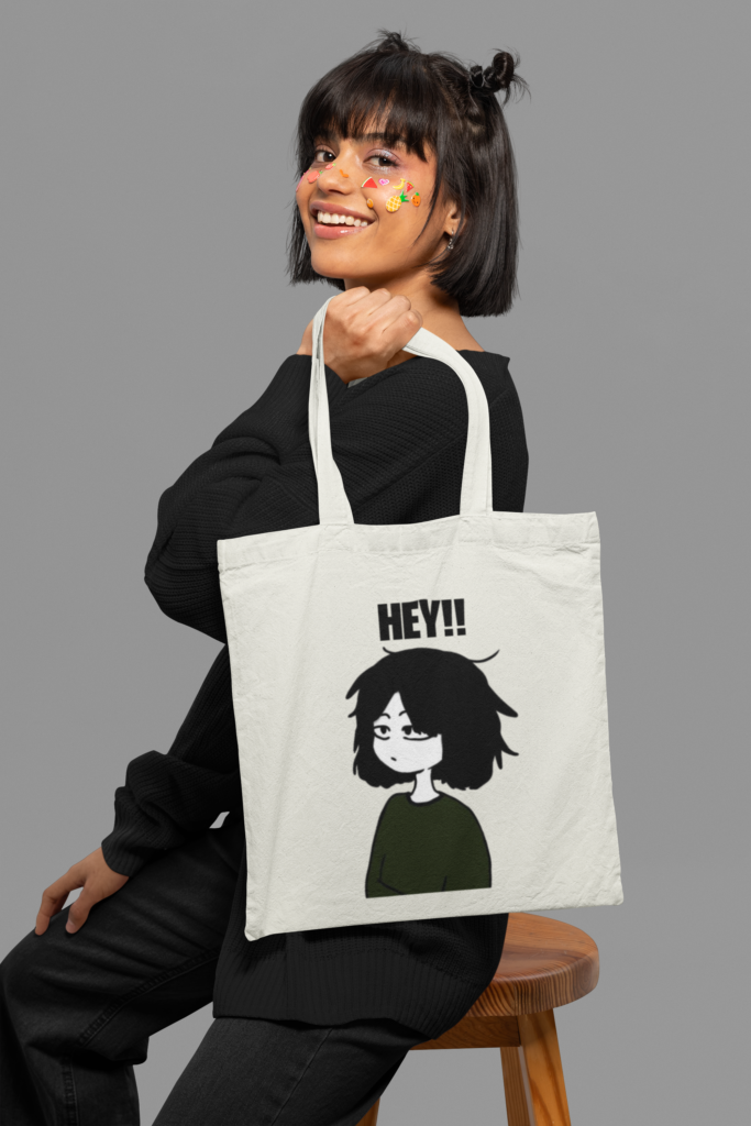 tote bag mockup featuring a joyful woman with stickers on her face m32364