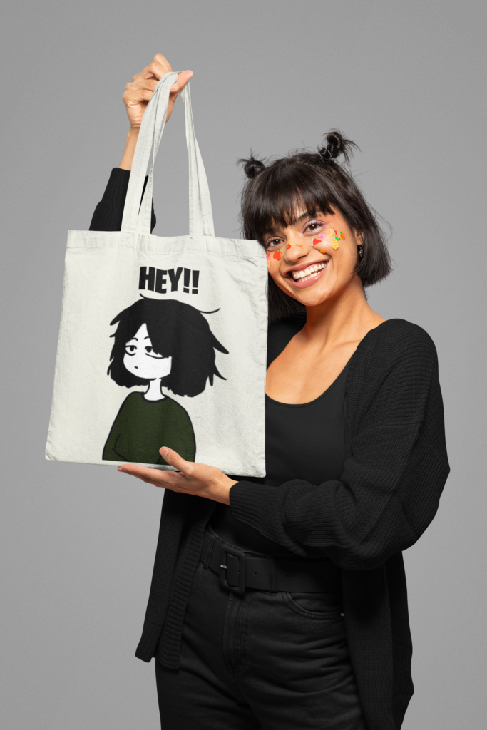tote bag mockup of a smiling woman with face stickers m32361