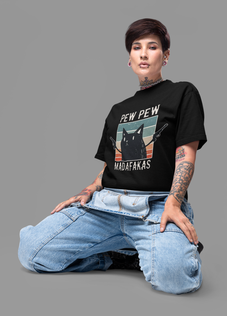 alternative inspired mockup of a woman with arm tattoos wearing an oversized tee m31652
