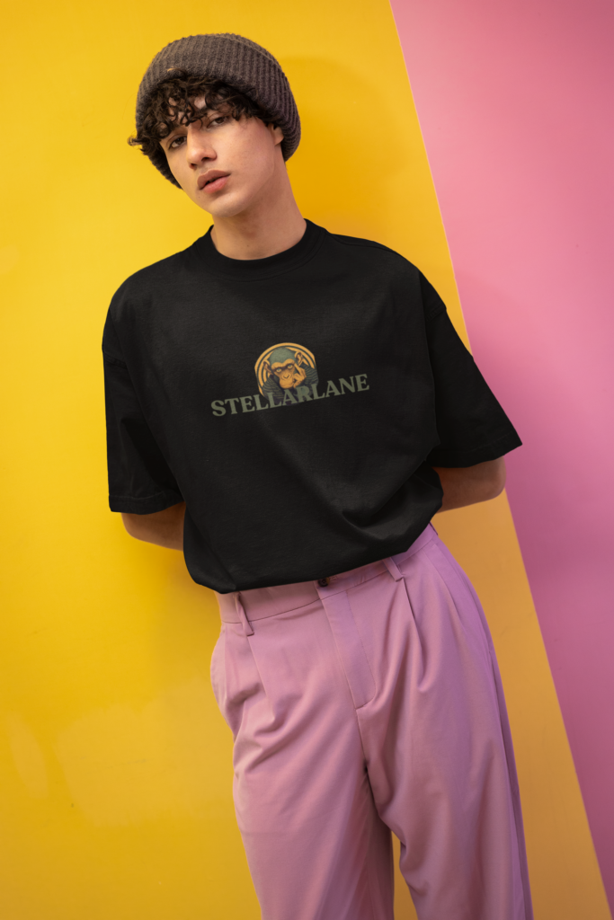 new pop wave style mockup of a man wearing an oversized tee in a colorful setting m38764 1