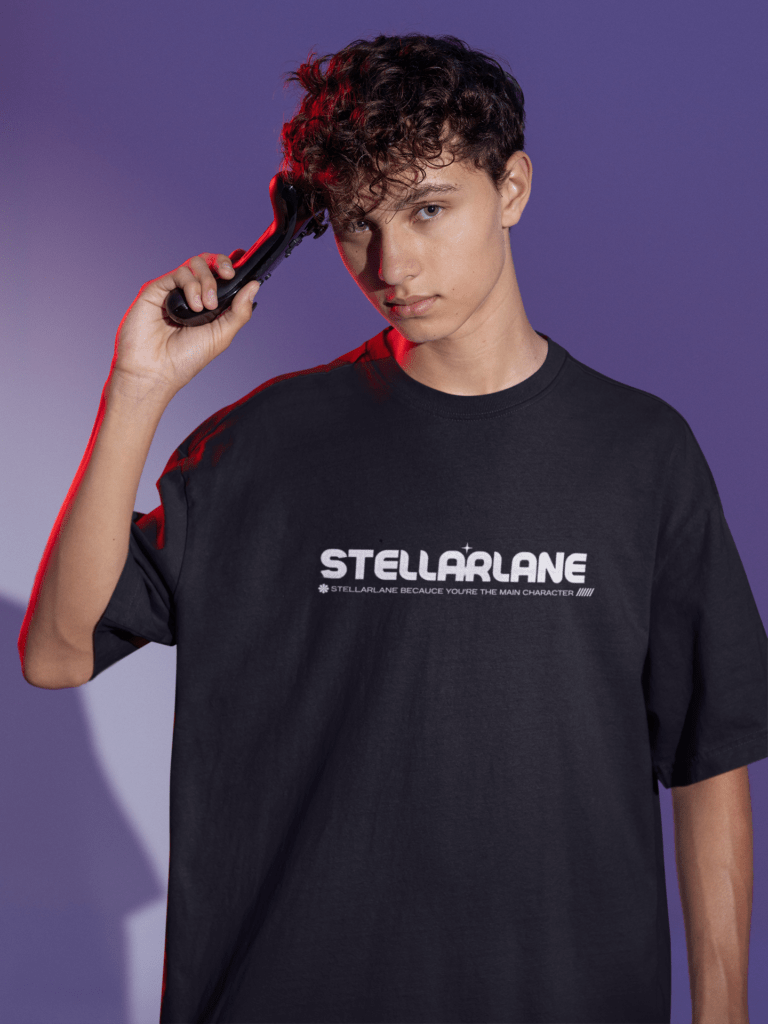 oversized tee mockup of a man posing with a game controller to his head m28457