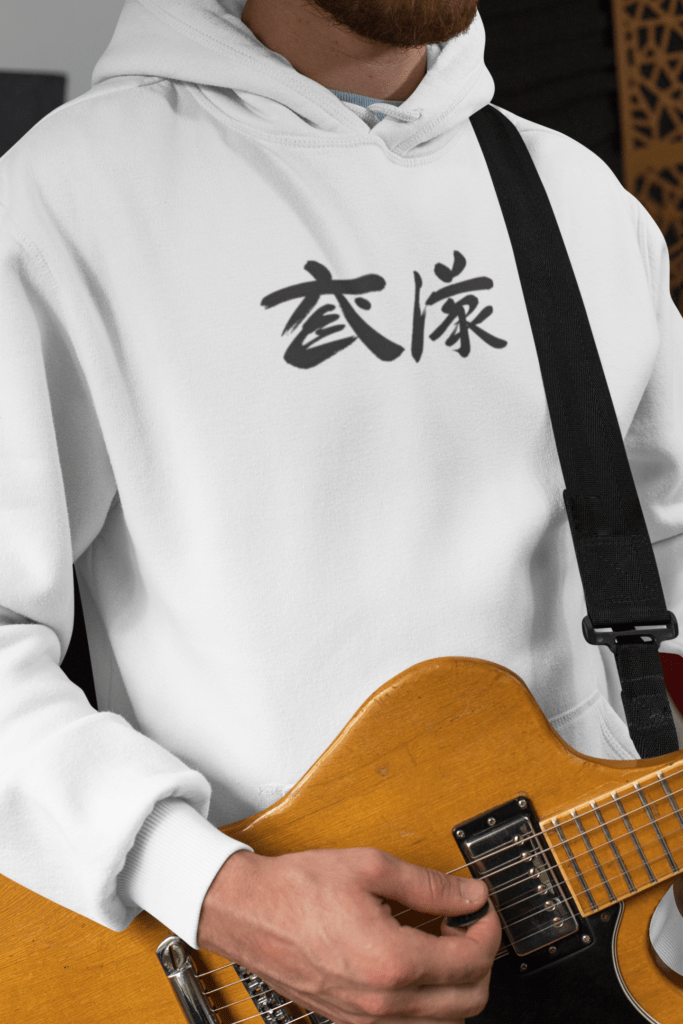 pullover hoodie mockup of a man playing guitar 33339 3