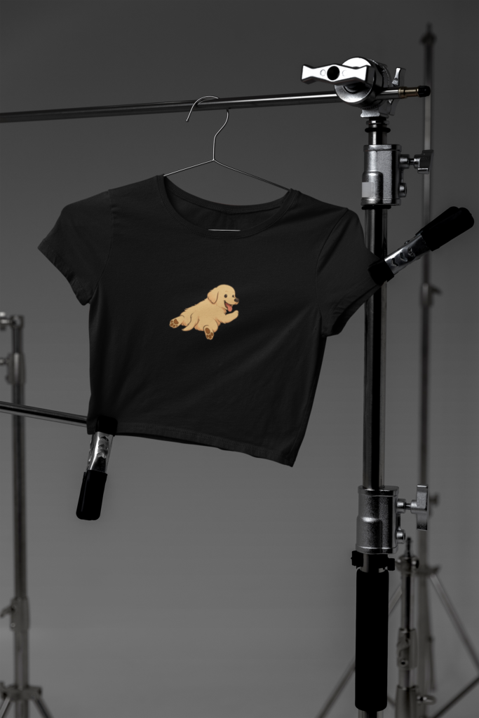 mockup of a bella canvas crop top hanging on photography tripods in a studio m37627 1 2