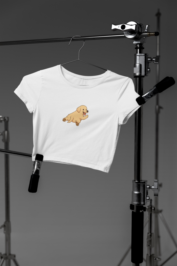 mockup of a bella canvas crop top hanging on photography tripods in a studio m37627 14