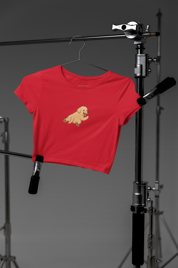 mockup of a bella canvas crop top hanging on photography tripods in a studio m37627 3 3