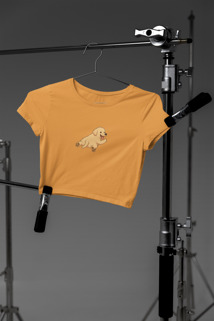 mockup of a bella canvas crop top hanging on photography tripods in a studio m37627 4 2