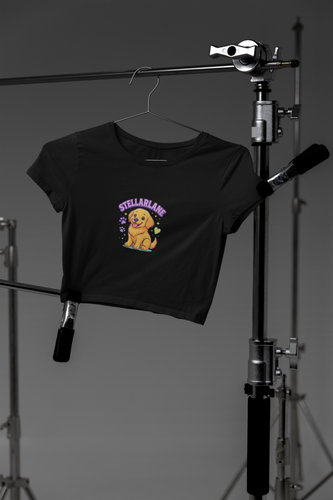 mockup of a bella canvas crop top hanging on photography tripods in a studio m37627 6 2