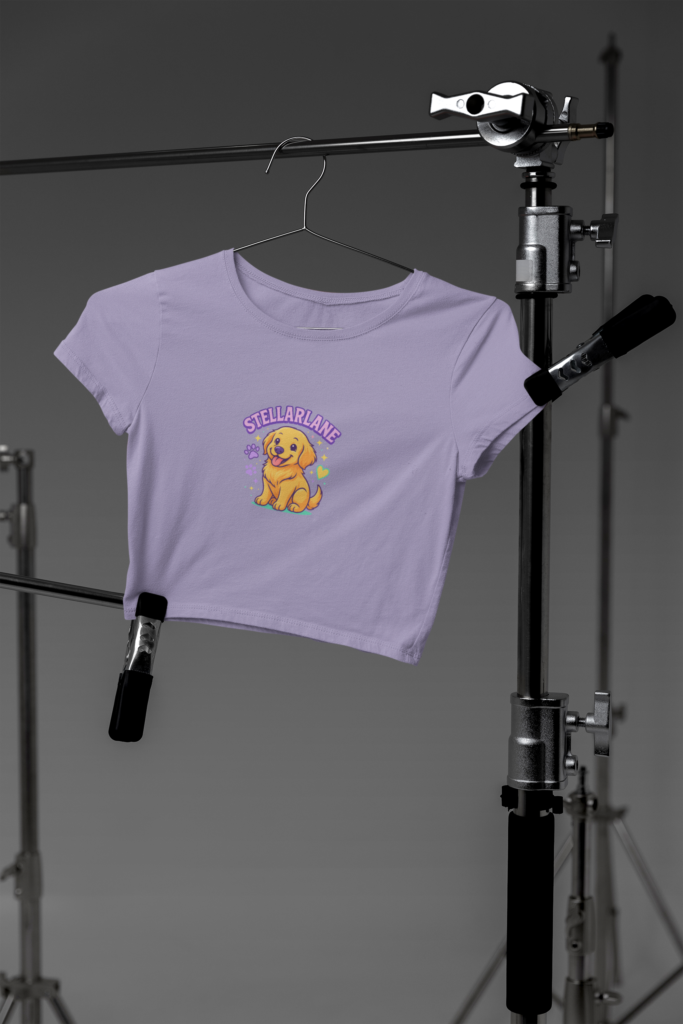 mockup of a bella canvas crop top hanging on photography tripods in a studio m37627 7 1