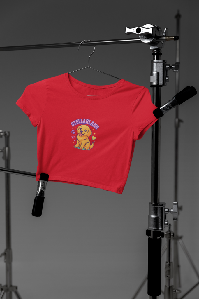 mockup of a bella canvas crop top hanging on photography tripods in a studio m37627 8 1